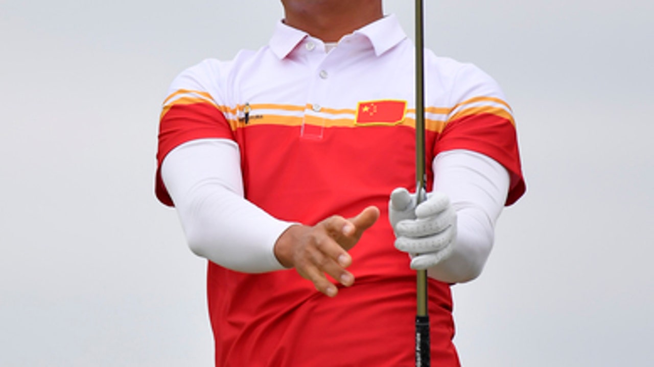 Denmark holds off challenge to win golf's World Cup
